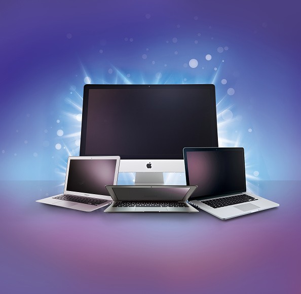 Illustration of Apple computer devices, including an iMac, MacBook and MacBook Air, created on December 8, 2014. 
