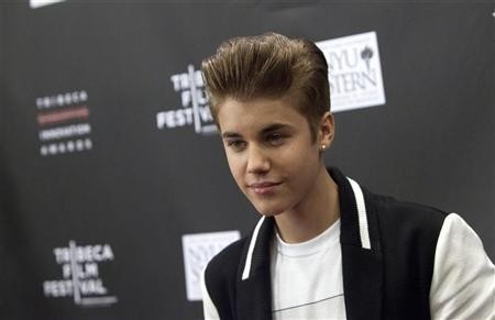 Justin Bieber attends the 3rd annual Tribeca Disruptive Innovation Awards during the 2012 Tribeca Film Festival at NYU Paulson Auditorium in New York April 27, 2012.