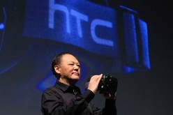 Peter Chou, chief executive officer of HTC Corp., unveils the View-A-Day virtual reality (VR) headset during a news conference ahead of the Mobile World Congress 2015 in Barcelona, Spain, on Sunday, Mar., 1, 2015. 