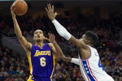 Los Angeles Lakers point guard Jordan Clarkson attempts a layup against Philadelphia 76ers' Nerlens Noel.
