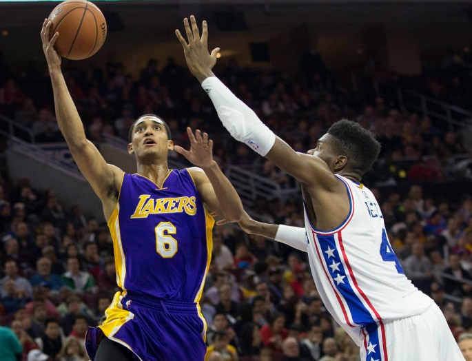 Los Angeles Lakers point guard Jordan Clarkson attempts a layup against Philadelphia 76ers' Nerlens Noel.