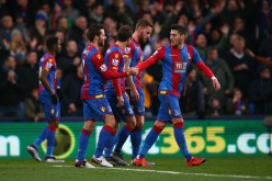 Crystal Palace midfielder Yohan Cabaye (2nd L) celebrates scoring his team's lone goal against Southampton.