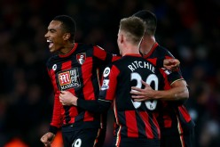 Bournemouth's Matt Ritchie, Junior Stanislas and Andrew Surman celebrate after the final whistle against Manchester United.