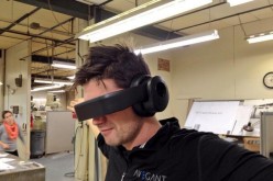An Avegant engineer testing the Glyph video headset.