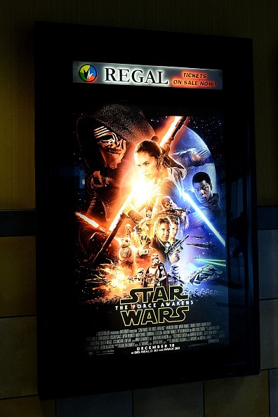 A poster is shown to promote the new hit 'Star Wars: The Force Awakens' at Regal Cinemas in Union Square on December 17, 2015 in New York City.