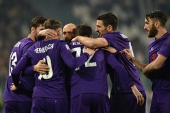 Fiorentina players celebrate Josip Ilicic's opening goal against Juventus.