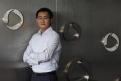 Tencent chairman and CEO Pony Ma poses at the company's headquarters in Nanshan Hi-Tech Industrial Park in the southern Chinese city of Shenzhen.