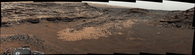 This May 22, 2015, view from the Mast Camera (Mastcam) in NASA's Curiosity Mars rover shows the "Marias Pass" area where a lower and older geological unit of mudstone -- the pale zone in the center of the image -- lies in contact with an overlying geologi