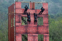 Special police attend an anti-terrorism drill in Taizhou, Zhejiang Province, on Nov. 20, 2015. 