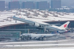 Aircraft are seen at the Beijing Capital International Airport on Nov. 23, 2015.