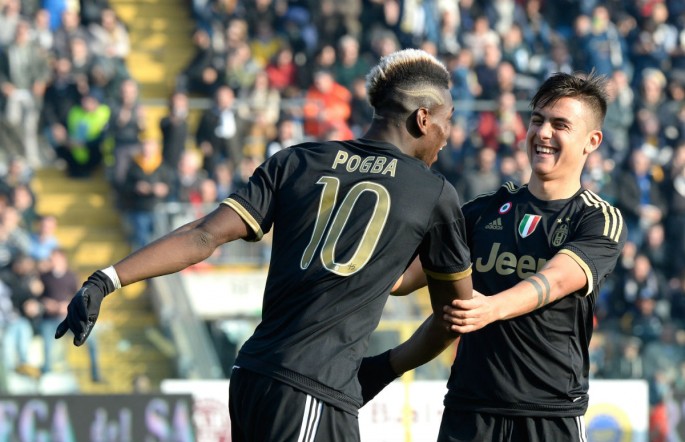 Juventus' Paul Pogba (#10) and Paulo Dybala celebrates a goal against Carpi.