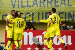 Villarreal players celebrate forward Roberto Soldado's opening goal against Real Madrid.