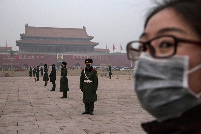 Chinese paramilitary police officers wear masks to protect themselves against pollution.