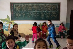 China To Give Residency Rights To Migrant Families