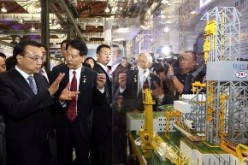 Premier Li Keqiang visits a Chinese equipment manufacturing exhibition in Rio De Janeiro, Brazil, in May. 