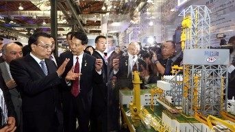 Premier Li Keqiang visits a Chinese equipment manufacturing exhibition in Rio De Janeiro, Brazil, in May. 