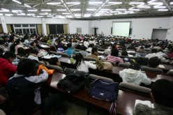 Students attend a lesson at the Northeast Normal University in Changchun of Jilin Province, China, on March 22, 2007.
