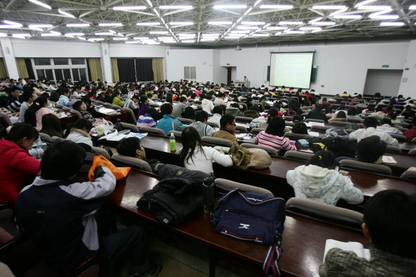 Students attend a lesson at the Northeast Normal University in Changchun of Jilin Province, China, on March 22, 2007.