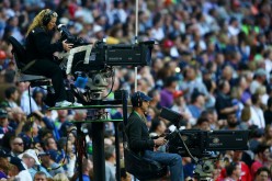 Local TV cameras cover Super Bowl XLIX between the New England Patriots and Seattle Seahawks.