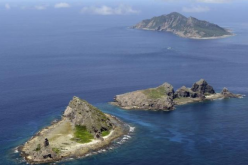China has been warned by Japan not to intrude near the disputed Senkaku Islands.