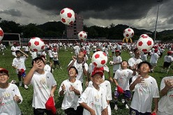 Kids undergoing soccer training in China.