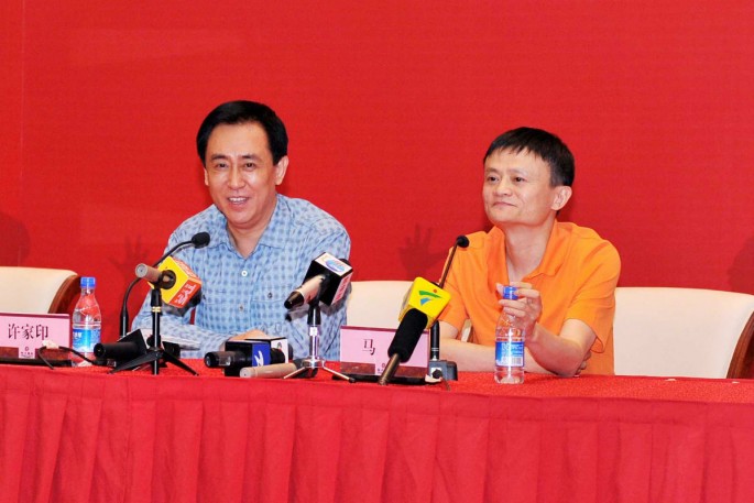 Evergrande Group chairman Xu Jiayin (L) and Alibaba Group founder and chairman Jack Ma.