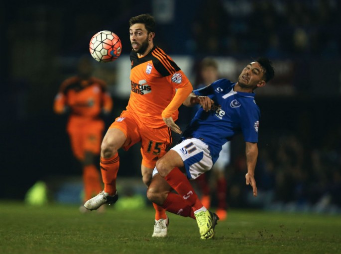 Australian midfielder Tommy Oar competes for the ball against Portsmouth's Gary Roberts during his recent stint with Ipswich Town.