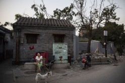Part of the efforts is to move some people from one-story hutong houses in the districts of Xicheng and Dongcheng as a means to avoid further damage to architecture.