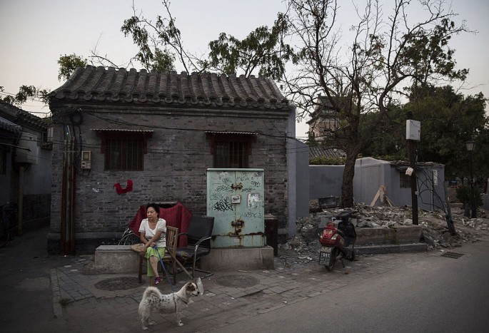 Part of the efforts is to move some people from one-story hutong houses in the districts of Xicheng and Dongcheng as a means to avoid further damage to architecture.