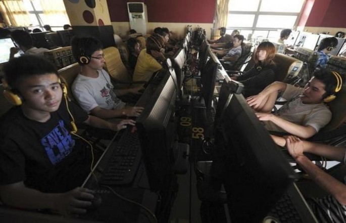File photo of people at an Internet cafe in Hefei, Anhui Province, Sept. 15, 2011. 
