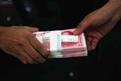 Prosecutors in Shanghai are cracking down on both the officials who received bribes and the people who handed them.