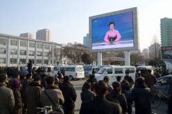 People in Pyongyang, North Korea, watch as the government announces the launching of a hydrogen bomb test on Jan. 6.
