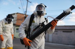 Health workers fumigate in an attempt to eradicate the mosquito which transmits the Zika virus in Recife, Pernambuco state, Brazil, on Jan. 28, 2016.
