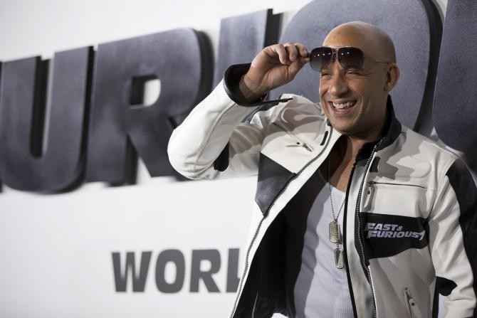 Cast member Vin Diesel poses at the premiere of "Furious 7" at the TCL Chinese theatre in Hollywood, California April 1, 2015. 