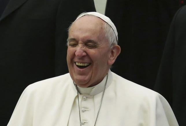 Pope Francis smiles as he leads his Wednesday general audience in Paul VI Hall at the Vatican, Jan. 28, 2015. 
