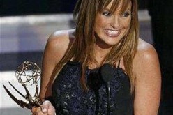 Mariska Hargitay holds her award for outstanding actress in a drama series for ''Law and Order : SVU'' at the 58th annual Primetime Emmy Awards at the Shrine Auditorium in Los Angeles, August 27, 2006. 