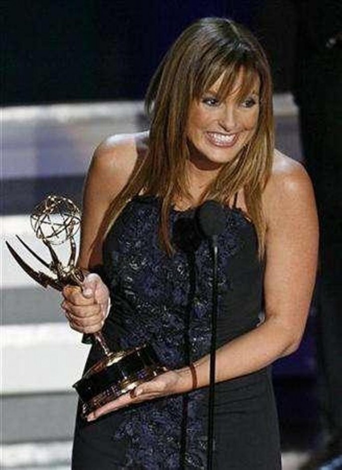 Mariska Hargitay holds her award for outstanding actress in a drama series for ''Law and Order : SVU'' at the 58th annual Primetime Emmy Awards at the Shrine Auditorium in Los Angeles, August 27, 2006. 
