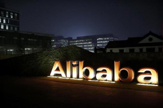 The logo of Alibaba Group is seen inside the company's headquarters in Hangzhou, Zhejiang Province, Nov. 11, 2014. 