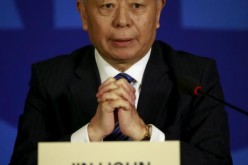 Asian Infrastructure Investment Bank (AIIB) President Jin Liqun speaks at a news conference during the bank's launching in Beijing on Jan. 17, 2016.