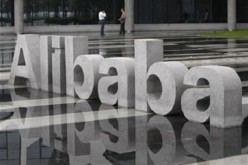 An analyst has called on Alibaba to make large overseas acquisitions if it were to maintain itself as an emerging global brand.