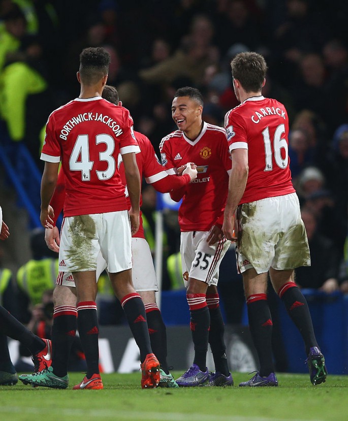 Manchester United winger Jesse Lingard celebrates his goal with teammates against Chelsea.