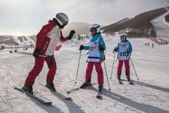 Tourists head to Chongli over the Lunar New Year holiday to try their hands at skiing.