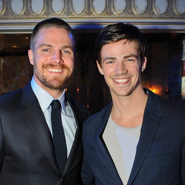 Stephen Amell and Grant Gustin play the title roles in the TV series "Arrow" and "The Flash," respectively.