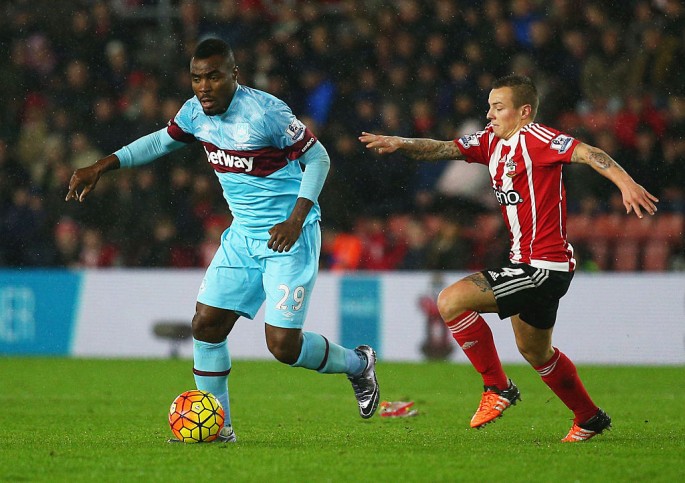 West Ham striker Emmanuel Emenike competes for the ball against Southampton's Jordy Clasie.