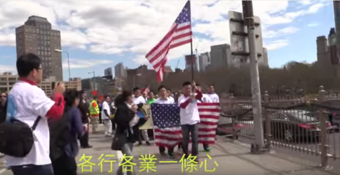 Members of the Chinese-American community join a rally to show support for Peter Liang in March last year.