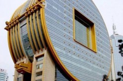 Guangzhou Circle, aka 'The Big Coin,' is home to the Guangdong Plastic Exchange.