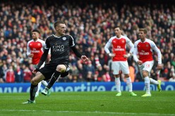 Leicester City striker Jamie Vardy (in black shirt) in action against Arsenal.