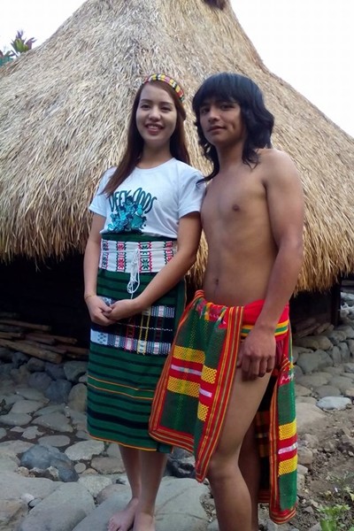 Wearing ethnic Igorot attires, Miss Mountain Province 2015 Shella Tudlong and Jeyrick Sigmaton, dubbed the Carrot Man, visit a nipa hut in Bontoc, Mountain Province.