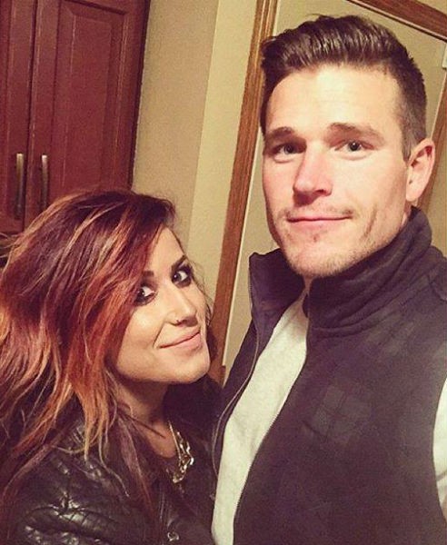 Chelsea Houska poses for a photo with fiancé Cole Deboer.