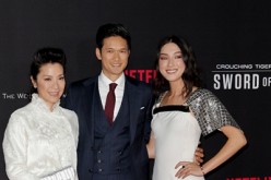 Michelle Yeoh, Harry Shum Jr. and Natasha Liu Bordizzo attend the Premiere of Netflix's 'Crouching Tiger, Hidden Dragon: Sword Of Destiny' at AMC Universal City Walk in Universal City, California.